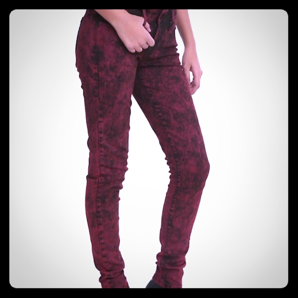 Red and black acid wash skinny jeans